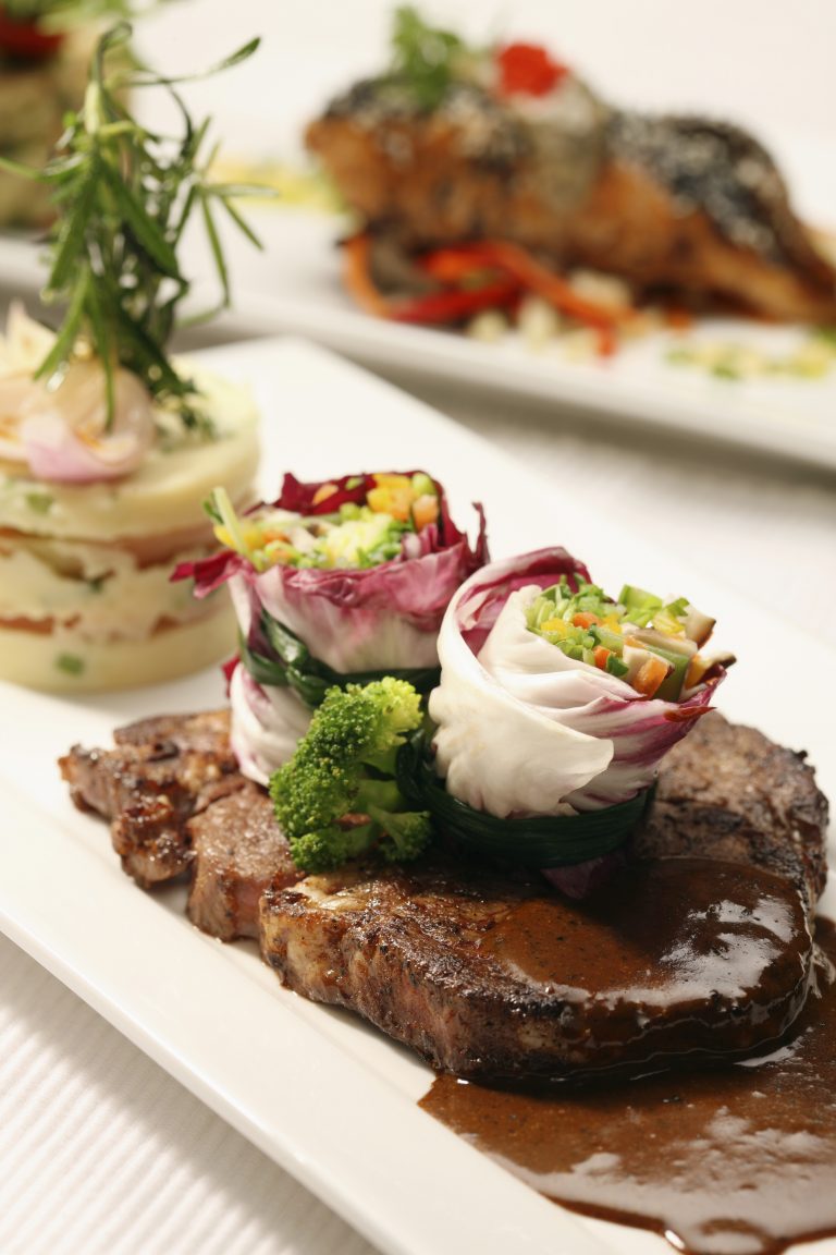 Steak with salad garnish