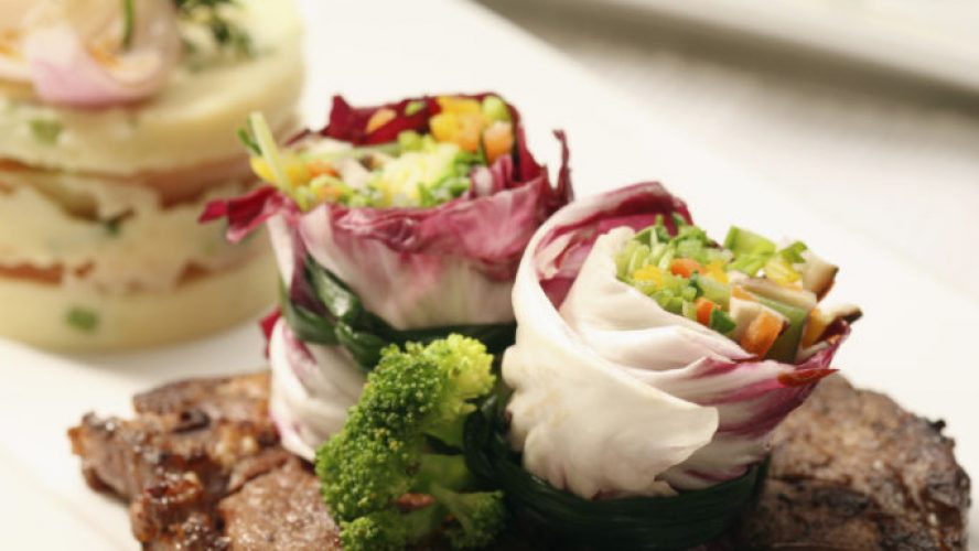 Steak with salad garnish